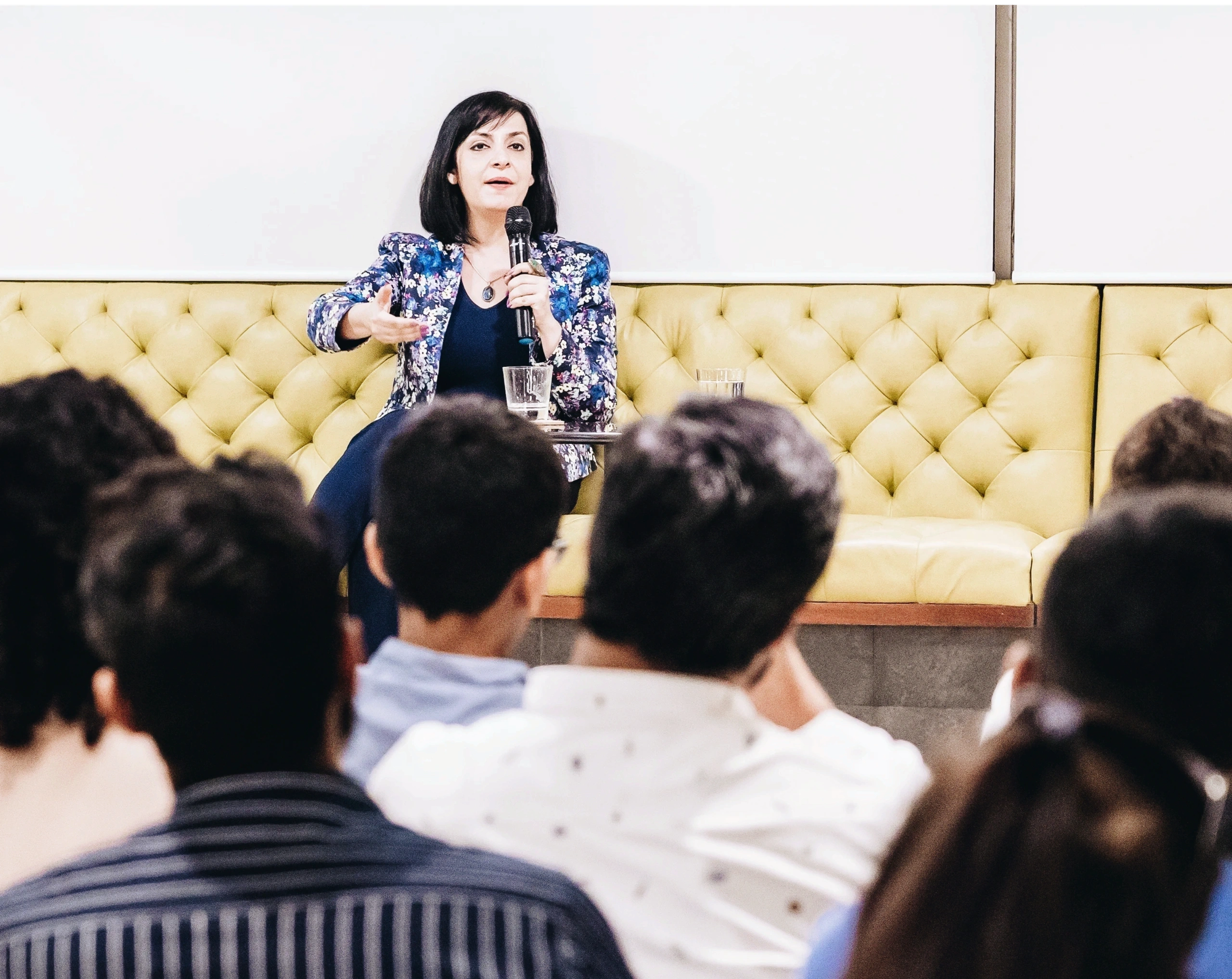 Priyanka Bakhru speaking at a conference panel
